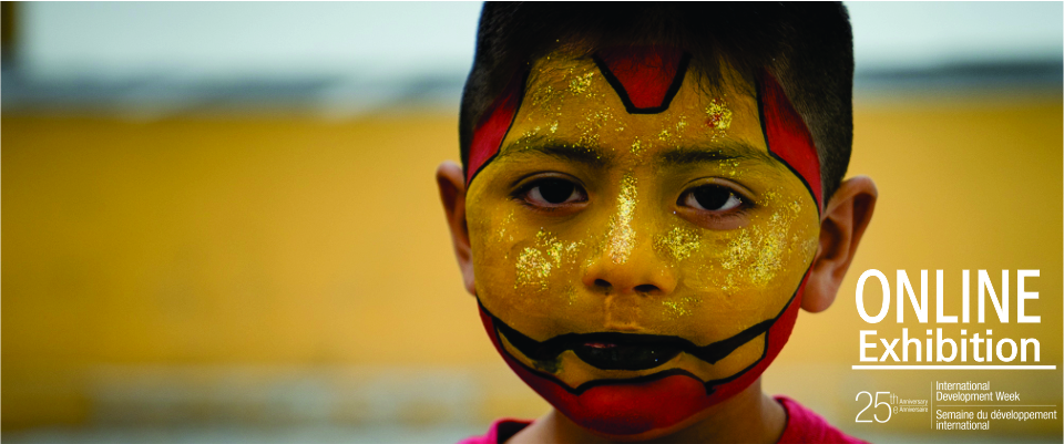 Boy with painted face.